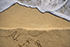 Gentle surf on a sandy beach