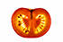 A slice of tomato backlit to show internal structure